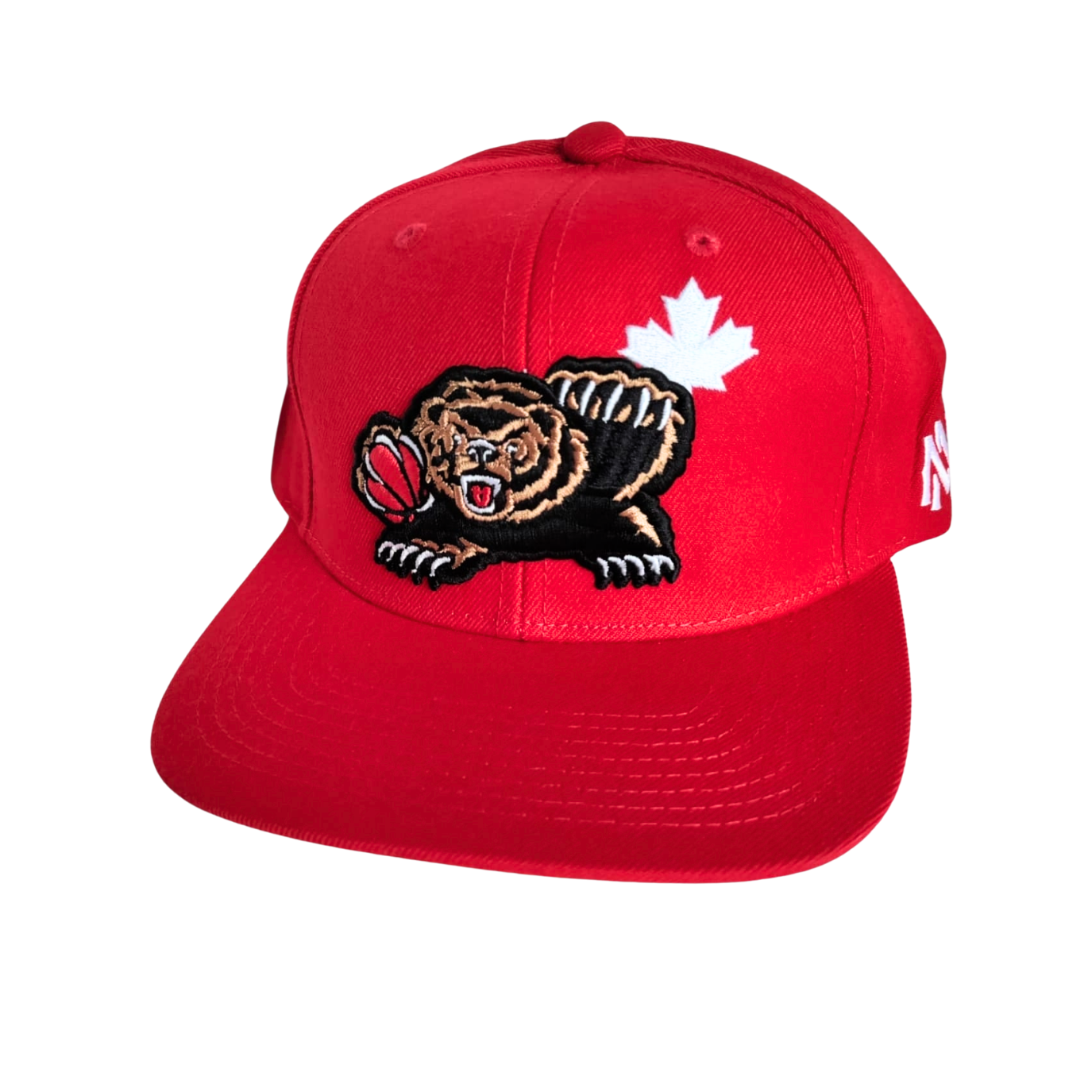 lose-up of a redhead cap, showcasing its vibrant red color and unique texture, with a soft fabric and adjustable strap at the back